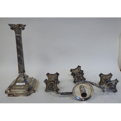 102 - A pair of late Victorian silver, two part candelabrum, each comprising twin scrolled branches, aroun... 