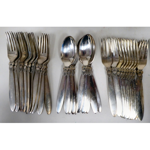 16 - Georg Jensen Cactus pattern Sterling silver tableware  comprising twelve table forks, twelve tablesp... 