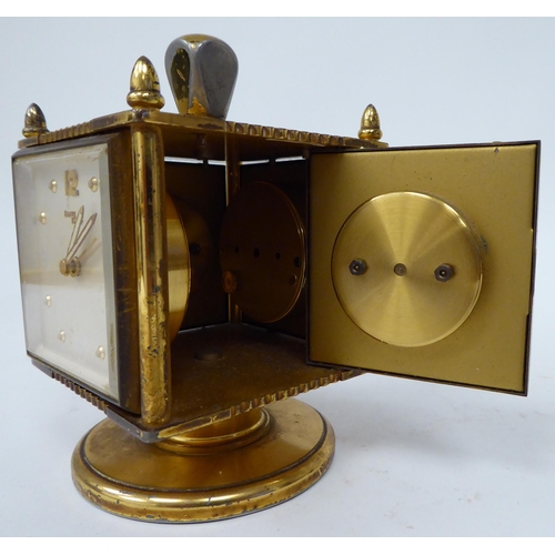 2 - A mid 20thC Imhof Weather Station, featuring a lacquered brass cased, combination, square box design... 