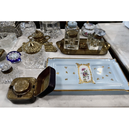 254 - Variously constructed inkwells: to include glass; china; and brass examples  largest 4