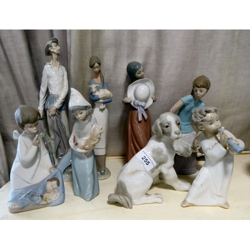 255 - Seven Lladro and one Nao porcelain figures: to include an angelic figure  6