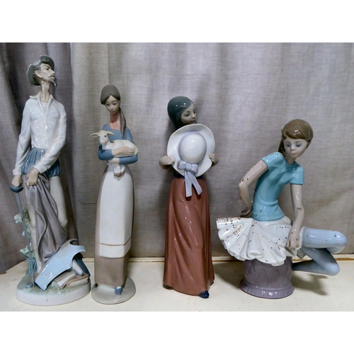 255 - Seven Lladro and one Nao porcelain figures: to include an angelic figure  6