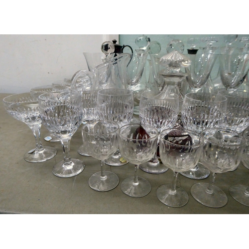 261 - Glassware: to include clear decanters; and Atlantis crystal drinking glasses