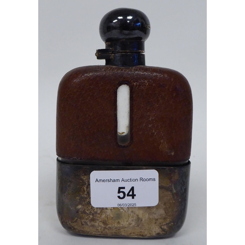 54 - A George VI silver mounted hip flask, part overlaid with pigskin, the outset hinged cap, secured on ... 