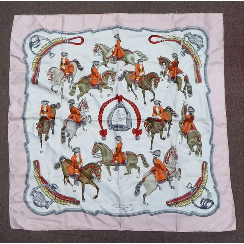 89 - A Hermes pale pink, grey and cream coloured silk scarf  'Reprise'  34