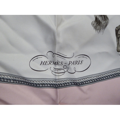 89 - A Hermes pale pink, grey and cream coloured silk scarf  'Reprise'  34