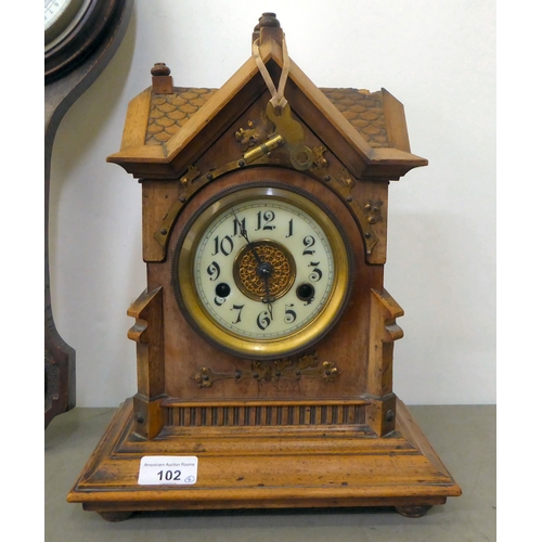 102 - A mixed lot: to include a walnut cased mantel clock; the 14 day movement, faced by a Roman dial  14