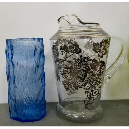 138 - Decorative art glass: to include a tri-coloured, floral patterned tapered vase  10