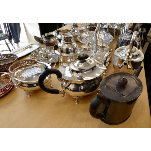 257 - Silver plated tableware: to include a cruet with four glass bottles
