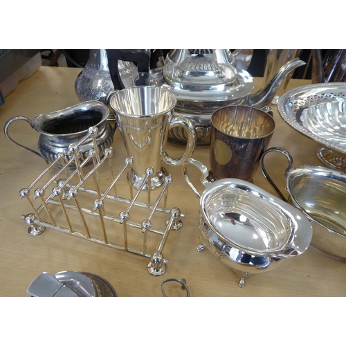 257 - Silver plated tableware: to include a cruet with four glass bottles