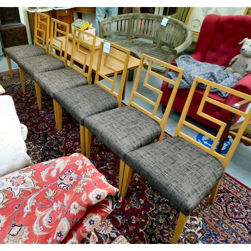 277 - A set of six modern puzzle back design, beech framed dining chairs with two-tone fabric upholstered ... 