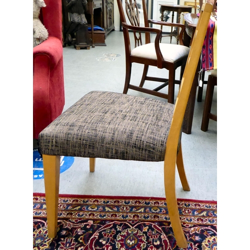 277 - A set of six modern puzzle back design, beech framed dining chairs with two-tone fabric upholstered ... 