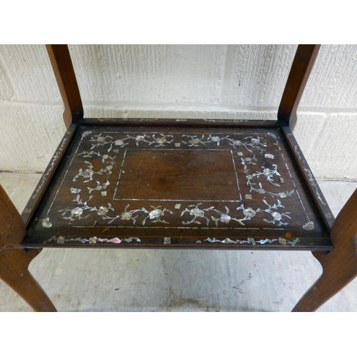 295 - An early/mid 20thC mother-of-pearl inlaid fruitwood, two tier occasional table, raised on splayed le... 