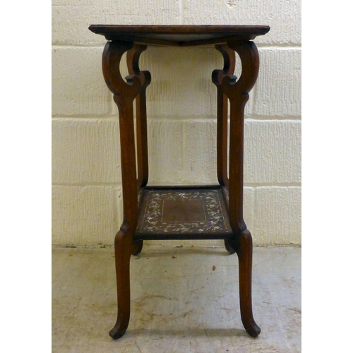 295 - An early/mid 20thC mother-of-pearl inlaid fruitwood, two tier occasional table, raised on splayed le... 