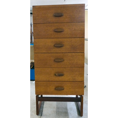 97 - A modern teak tallboy, consisting of six drawers, raised on shaped legs  46