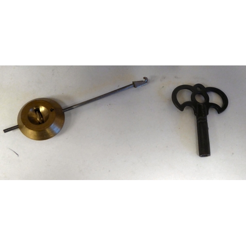 100 - A late 19thC French gilt metal mounted and laminated, three piece clock garniture with ornately cast... 