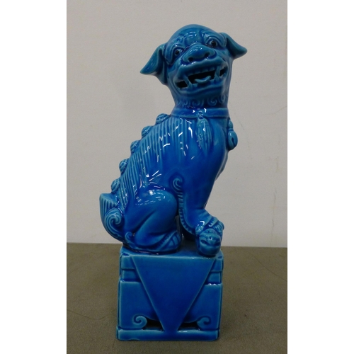 103 - Chinese and Japanese ceramics: to include a blue glazed Dog of Fo  6.5