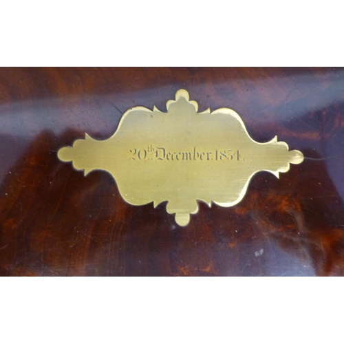 105 - An early 19thC flame veneered mahogany tea casket with straight sides, opposing, flush fitting brass... 