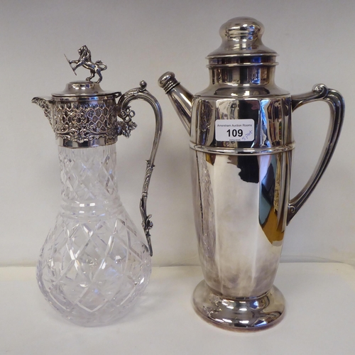 109 - Silver plated tableware: to include a cocktail jug of panelled, tapered form; and a cut crystal wine... 