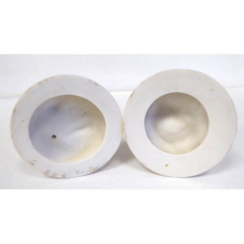 112 - A Royal Worcester Parianware figure, a classical maiden with a dove; and another 'Mourning Dove'  th... 