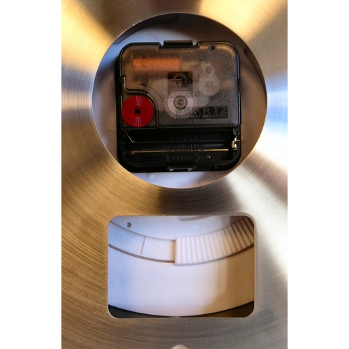 65 - A dealer display advertising wall timepiece for 'Rolex Oyster Perpetual', faced by a black baton dia... 