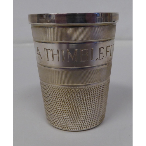 68 - A silver 'Just a Thimble Full' tot cup&nbsp; BC & S&nbsp; Birmingham 1979&nbsp; cased
