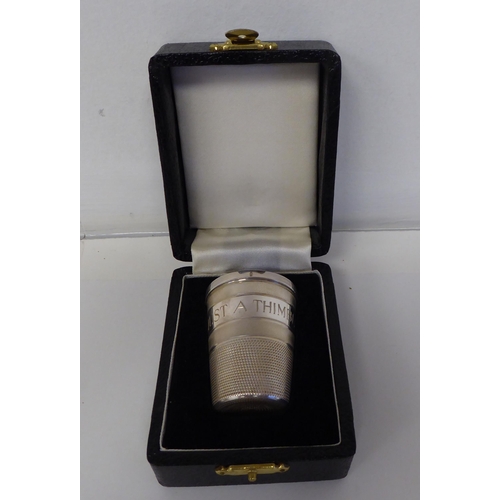 68 - A silver 'Just a Thimble Full' tot cup&nbsp; BC & S&nbsp; Birmingham 1979&nbsp; cased
