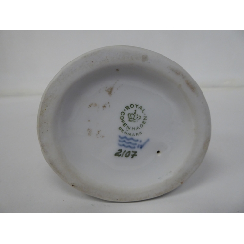 70 - A Royal Copenhagen porcelain figure, No.2107, a faun with an owl  6.25