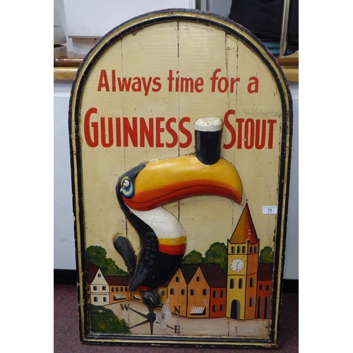 73 - A vintage advertising sign, inscribed 'Always Time for a Guinness Stout' featuring a Toucan, in an a... 