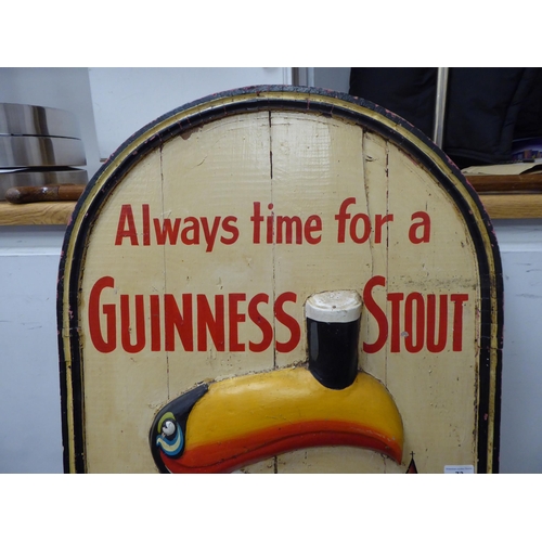 73 - A vintage advertising sign, inscribed 'Always Time for a Guinness Stout' featuring a Toucan, in an a... 