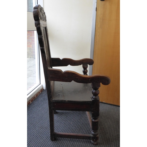 75 - An 17th/18thC oak wainscot chair, the panelled back with an inlaid border, set in an ornate diamond ... 
