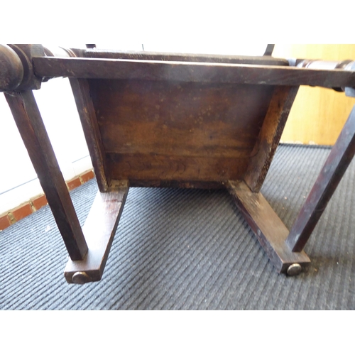 75 - An 17th/18thC oak wainscot chair, the panelled back with an inlaid border, set in an ornate diamond ... 