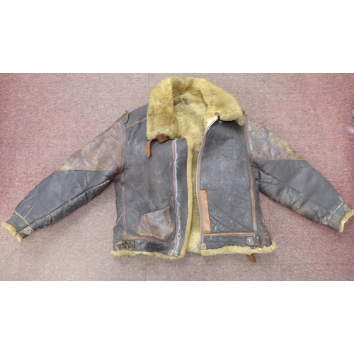 90 - A vintage USA B3 brown hide flight jacket with a sheepskin lining  approx. 36