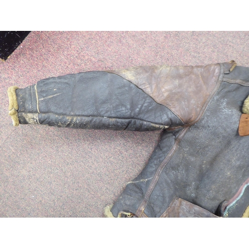 90 - A vintage USA B3 brown hide flight jacket with a sheepskin lining  approx. 36
