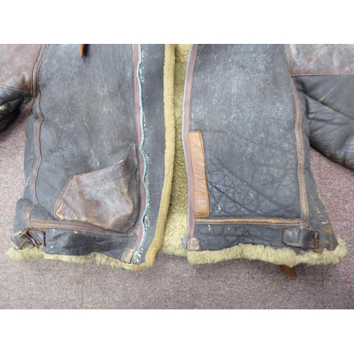 90 - A vintage USA B3 brown hide flight jacket with a sheepskin lining  approx. 36
