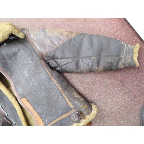 90 - A vintage USA B3 brown hide flight jacket with a sheepskin lining  approx. 36