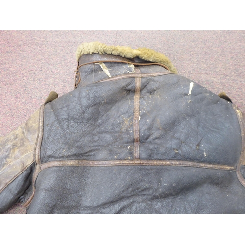 90 - A vintage USA B3 brown hide flight jacket with a sheepskin lining  approx. 36