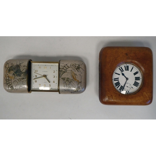 98 - A Europa traveller's timepiece, having an integral sliding, two-part lacquered brass and coloured en... 