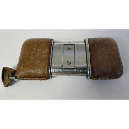 115 - A Movado Ermeto stitched snakeskin clad mechanical watch, faced by a gilded square Arabic dial, stam... 