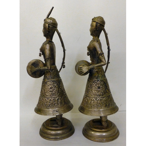 23 - Two modern Asian galvanised metal figures, playing musical instruments&nbsp; 15
