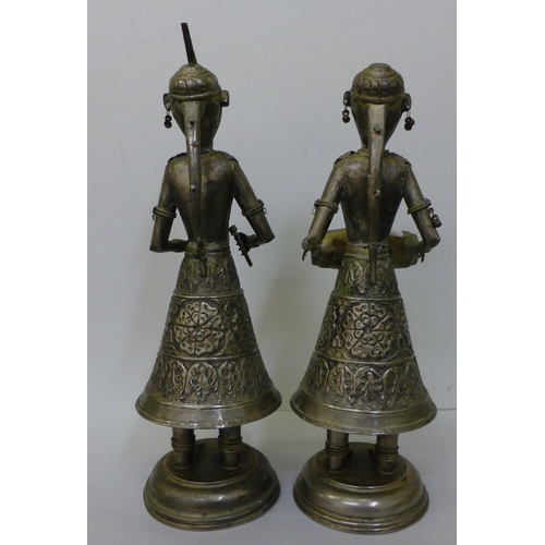23 - Two modern Asian galvanised metal figures, playing musical instruments&nbsp; 15