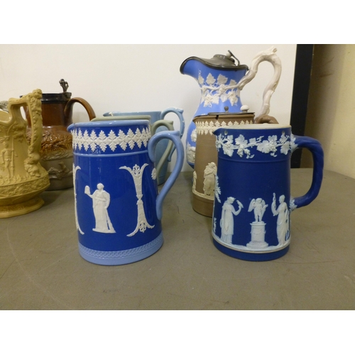 280 - 19thC and later jugs: to include a Victorian salt glazed Harvest jug with a silver plated lid&nbsp; ... 