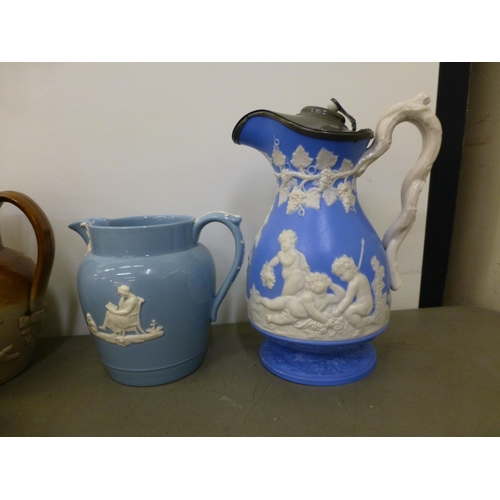 280 - 19thC and later jugs: to include a Victorian salt glazed Harvest jug with a silver plated lid&nbsp; ... 