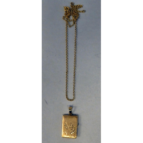 10 - An 18ct gold pendant locket&nbsp; (approx. weight 7 grams), on a 9ct gold chain (approx. 2.9 grams)