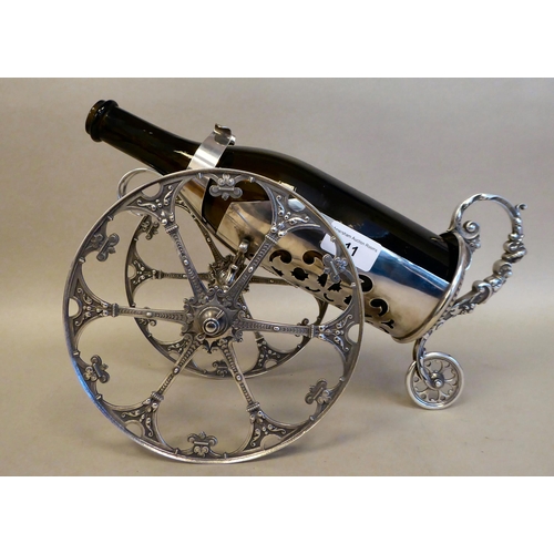 11 - A WMF silver plated wine cannon, on two wheels  7.5