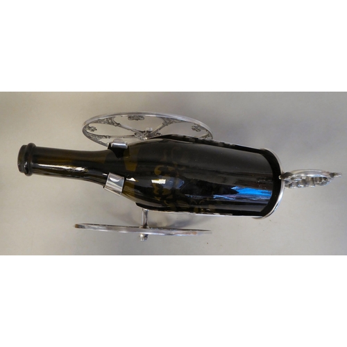 11 - A WMF silver plated wine cannon, on two wheels  7.5