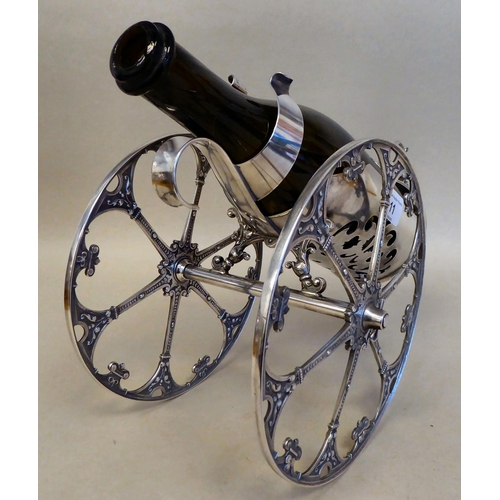11 - A WMF silver plated wine cannon, on two wheels  7.5