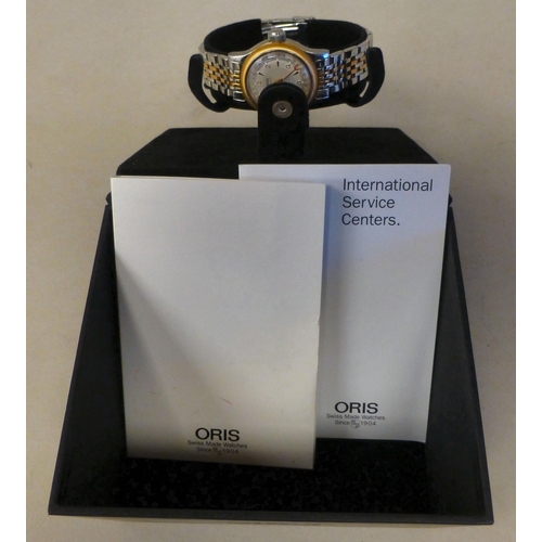 12 - A lady's Oris stainless steel cased, automatic bracelet watch with an Arabic dial&nbsp; boxed