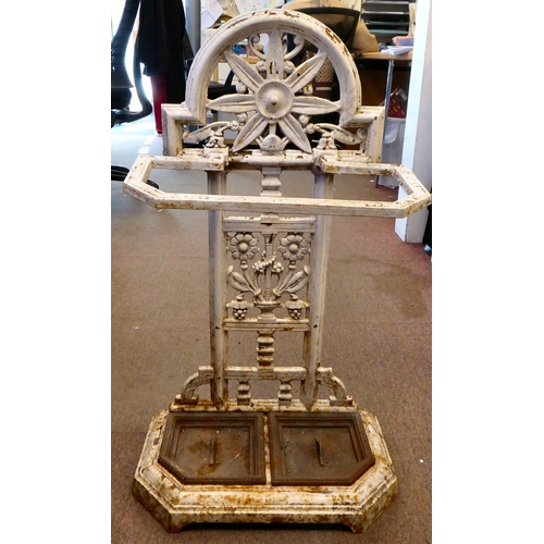 16 - A late Victorian Falkirk painted cast iron stickstand, attributed to Christopher Dresser with decora... 