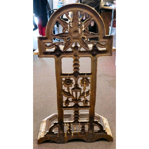 16 - A late Victorian Falkirk painted cast iron stickstand, attributed to Christopher Dresser with decora... 